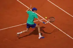 Alcaraz produces another major comeback to win French Open final in five-set thriller against Sinner